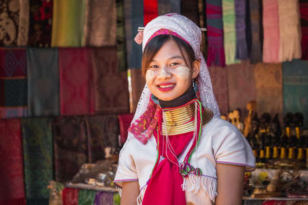 Long-necked Karen girl wearing ttraditional clothes. Chiang Rai, Thailand - November 15, 2017.のeditorial素材