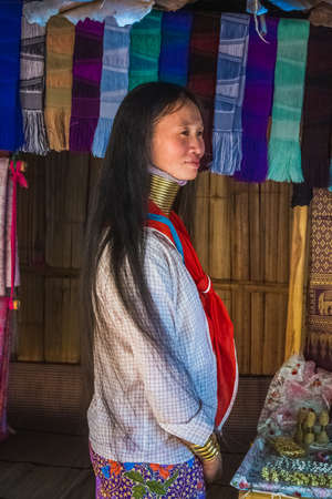 Long-necked Karen girl wearing ttraditional clothes. Chiang Rai, Thailand - November 15, 2017.のeditorial素材