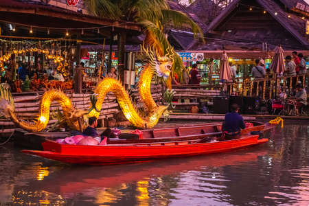 Famous Pattaya Floating Market which has traditional rowing boats. Villagers sell traditional foods...