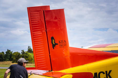 Skydiver prepares the plane at the skydive center. Franz Josef Glacier, New Zealand - January 02...