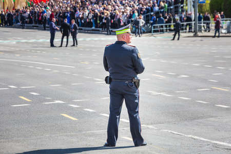 Police men at guard at the celebration of the 75th anniversary of the victory in the Great Patriotic War, parade of May 9 in Minsk, Belarus. Minsk, Belarus - May 9 2020.のeditorial素材