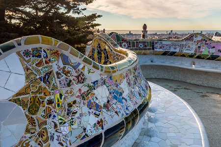 Park Guell is a public park composed of gardens, mosaics and architectural elements located on...