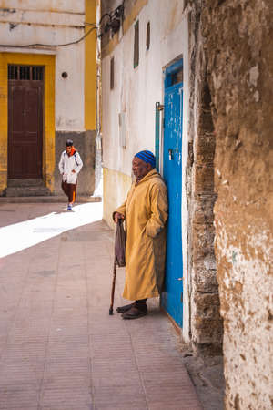 Man wearing traditional kaftan at the streets of Essaouira, Morocco. Essaouira, Morocco - April 14 2016.のeditorial素材