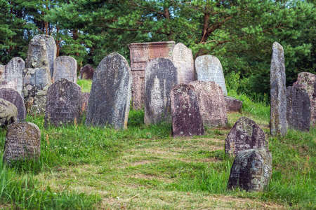 Jewish cemetery. The Jews from the ghetto were gathered near the Druyka River and shot into a large grave. More than 1,000 Jews were killed in Druya. Druya, Belarus - July 19 2020.のeditorial素材
