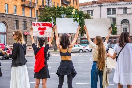 Woman holding signs during peaceful protests against stolen presidential elections in Minsk, Belarus. Minsk, Belarus - August 15 2020.のeditorial素材