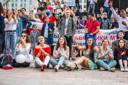 Protesters at the main Independence Square near Government House during peaceful protest against rigged elections in Minsk, Belarus. Minsk, Belarus - August 15 2020.のeditorial素材