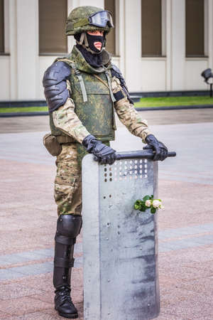 Soldiers and flowers at the main Independence Square near Government House during peaceful protest against rigged elections in Minsk, Belarus. Minsk, Belarus - August 15 2020.のeditorial素材