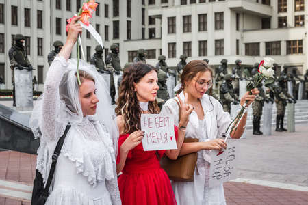Soldiers and art performers at the main Independence Square near Government House during peaceful protest against rigged elections in Minsk, Belarus. Minsk, Belarus - August 15 2020.のeditorial素材