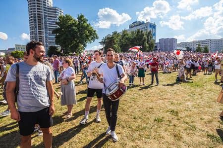 Happy people during biggest peaceful protests in Belarus history against rigged presidential elections in Minsk, Belarus. Minsk, Belarus - August 16 2020.のeditorial素材