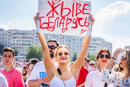 Happy people during biggest peaceful protests in Belarus history against rigged presidential elections in Minsk, Belarus. Minsk, Belarus - August 16 2020.のeditorial素材