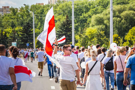 Happy people during biggest peaceful protests in Belarus history against rigged presidential elections in Minsk, Belarus. Minsk, Belarus - August 16 2020.のeditorial素材