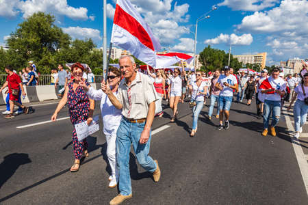 Happy people during biggest peaceful protests in Belarus history against rigged presidential elections in Minsk, Belarus. Minsk, Belarus - August 16 2020.のeditorial素材