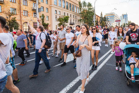 Happy people during biggest peaceful protests in Belarus history against rigged presidential elections in Minsk, Belarus. Minsk, Belarus - August 16 2020.のeditorial素材