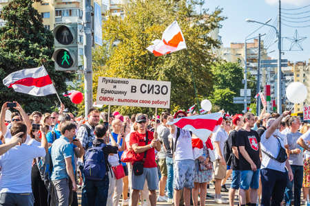 Happy people during biggest peaceful protests in Belarus history against rigged presidential elections in Minsk, Belarus. Minsk, Belarus - August 16 2020.のeditorial素材