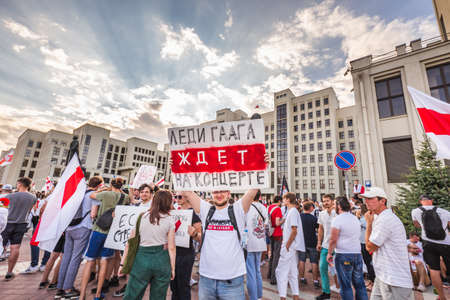 Happy people during biggest peaceful protests in Belarus history against rigged presidential elections in Minsk, Belarus. Minsk, Belarus - August 16 2020.のeditorial素材