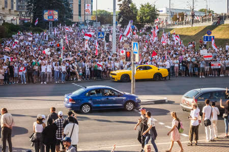 Happy people during biggest peaceful protests in Belarus history against rigged presidential elections in Minsk, Belarus. Minsk, Belarus - August 16 2020.のeditorial素材