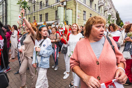 Women during peaceful protests in Belarus against rigged presidential elections in Minsk, Belarus. Minsk, Belarus - August 30 2020.のeditorial素材
