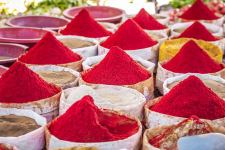 Selection of spices on a traditional Moroccan market (souk) in Guelmim, Morocco.の写真素材