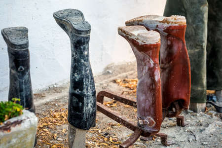 Upside down mud boots at the ranch in Camargue, France.