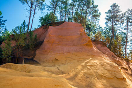 The Ocher Path le Sentier des Ocres through the Red Cliffs of Roussillon Les Ocres, a nature park in Vaucluse, Provence, France.の写真素材