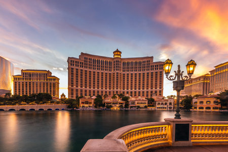 Fountains of Bellagio hotel with bright lights of hotels on Las Vegas Strip in Paradise, Nevada. Las Vegas, USA - September 28, 2018.のeditorial素材