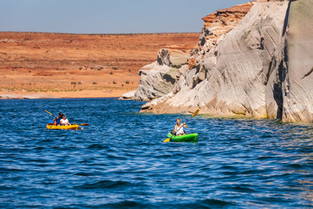 Kayaking Lake Powell Lone Rock at Sunset Utah USA. Page, USA - September 21, 2018.のeditorial素材
