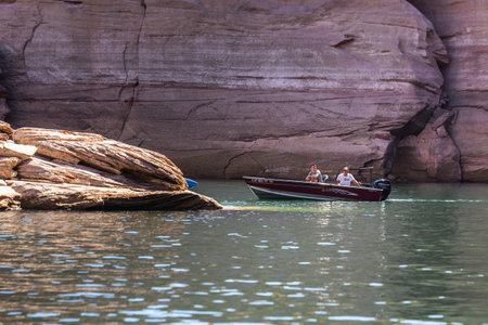 Boating at Lake Powell Lone Rock at Sunset Utah USA. Page, USA - September 21, 2018.のeditorial素材