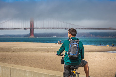 Travel in San Francisco, tourists enjoying the view of Golden Gate Bridge, San Francisco, California, USA. San Francisco, USA - September 14 2018.のeditorial素材
