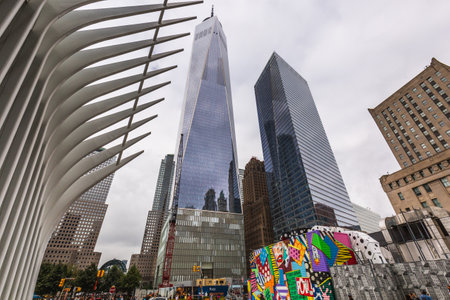 Graffiti near The World Trade Center in lower Manhattan and Oculus. Detailed architecture background taken of the One World Trade Center Transport Hub. New York, USA - October 09 2018.のeditorial素材