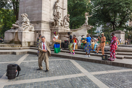 Group dance in Central Park enjoy foliage season. The city attracts 50 million people annually. New York, USA - October 10 2018.のeditorial素材