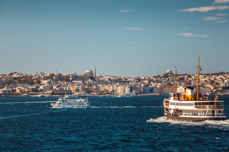 Istanbul shoreline from the boat. Business centers and luxurious mansions with houses over the hills at the shore of Bosphorus. Istanbul, Turkey - October 01 2020.のeditorial素材