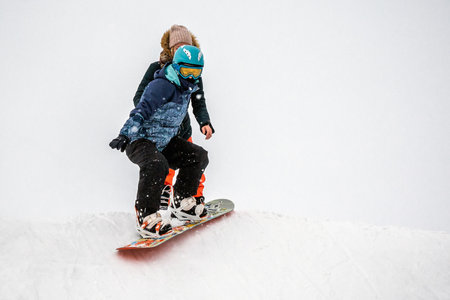 People with a snowboard on the ski resortのeditorial素材