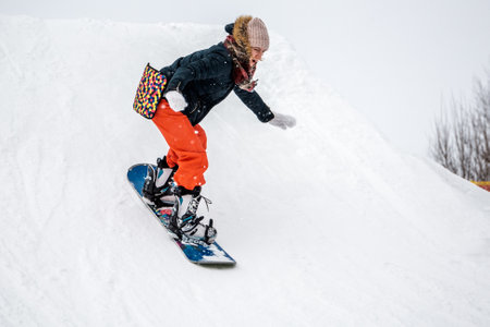 People with a snowboard on the ski resortのeditorial素材