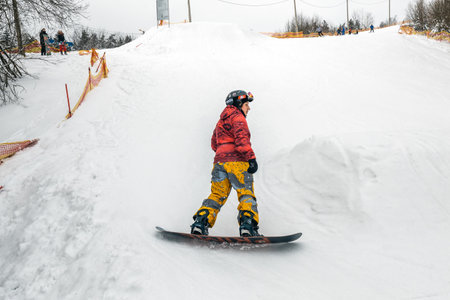 People with a snowboard on the ski resortのeditorial素材