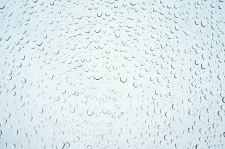 Water drops on glass background. raindrops on window glass. Shallow DOFの写真素材