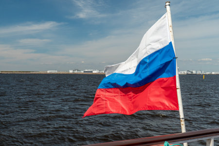 Flag of Russia on the bow of the ship in the open sea Kronstadtの写真素材