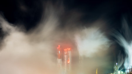 Fog and smoke in a chemical factory at night. selective focus.の写真素材