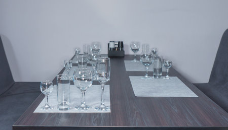 Empty glasses on the table in the conference room. 3d renderingの写真素材