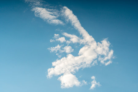 White clouds in the blue skybe used as background.の写真素材