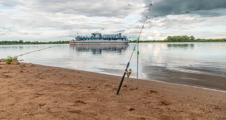 Fishing on the bank of the Volga river in Russia.の写真素材