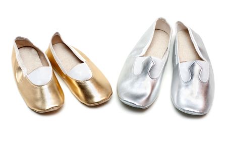 Two pairs ballet baby footwear on white backgroundの写真素材