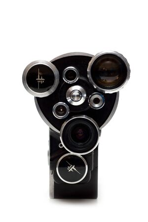 Old movie camera 16 mm with three lenses on white backgroundの写真素材