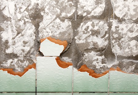 Background from broken wall, part broken tiled barの写真素材