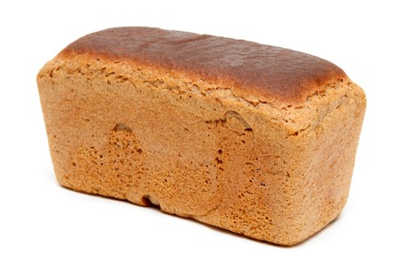 Loaf of fresh appetizing bread on white background