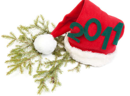 Inscription 2010 on red hat santa on white background