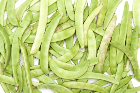 Green beans in the form of a white background