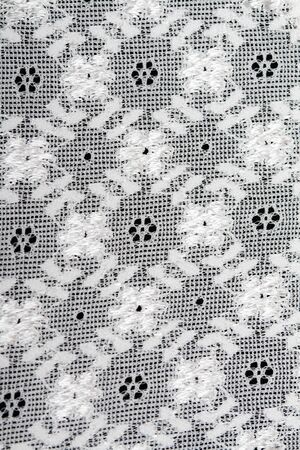 Background of white lace with embroidered designsの写真素材