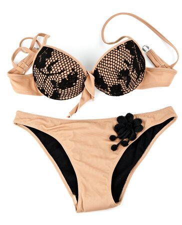 beige swimsuit isolated on white backgroundの写真素材