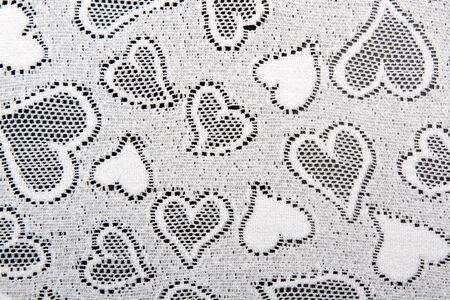 white lace patterned with hearts background