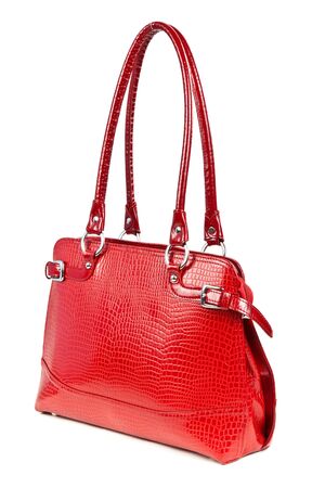 red leather ladies handbag isolated on a white backgroundの写真素材